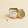 California golden poppy scented soy candle in a brushed gold tin with a wooden wick.