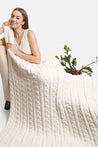 Cozy cable knit throw in ivory color