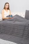 Cozy cable knit throw in charcoal color